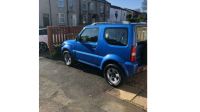 Breaking Suzuki Jimny in Blue